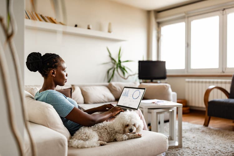 African-American woman working at home due to pandemic isolation. Belgrade, Serbia
