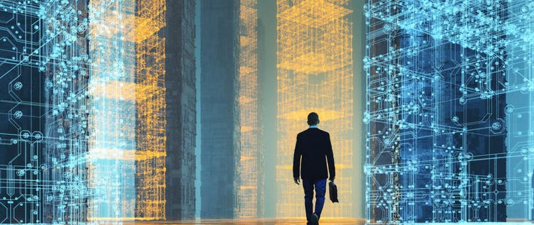 A businessman carrying a briefcase, walking away with his back to the camera towards blue and yellow technical backdrop