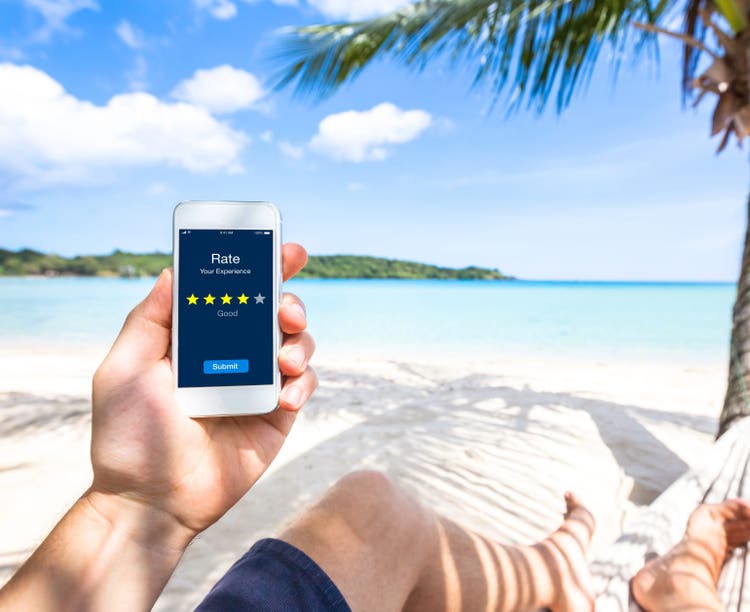 man reviewing at the beach