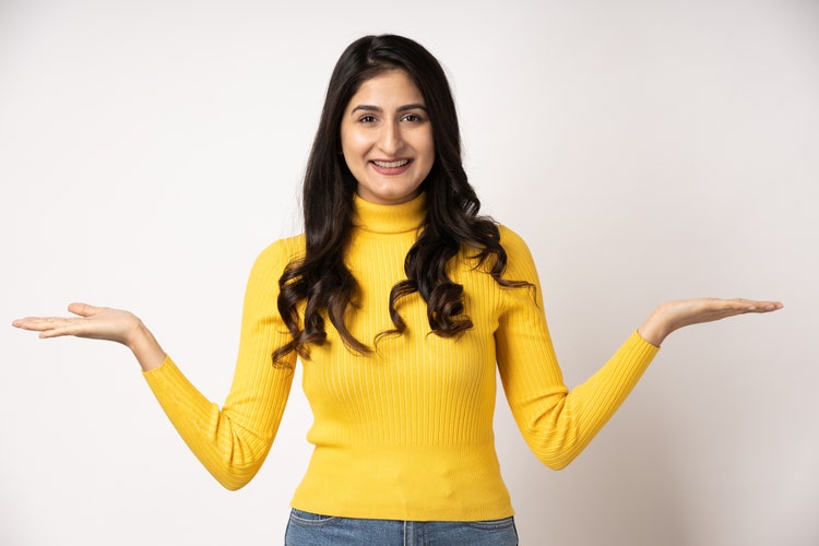 Portrait of young woman on white background